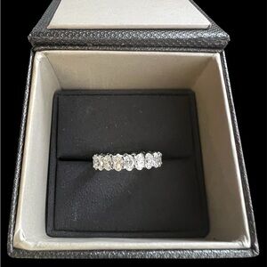 14 it white gold and diamond ring the is set with twenty oval brilliant